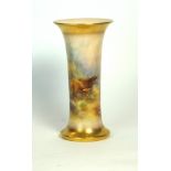 A fine Royal Worcester hand painted cylindrical vase
Decorated with highland cattle in landscape by