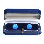 A pair of early 20th Century guilloche enamel cufflinks
The two circular plaques having decorative
