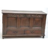 A 17th Century carved oak three panel blanket chest
The rectangular moulded three plank top