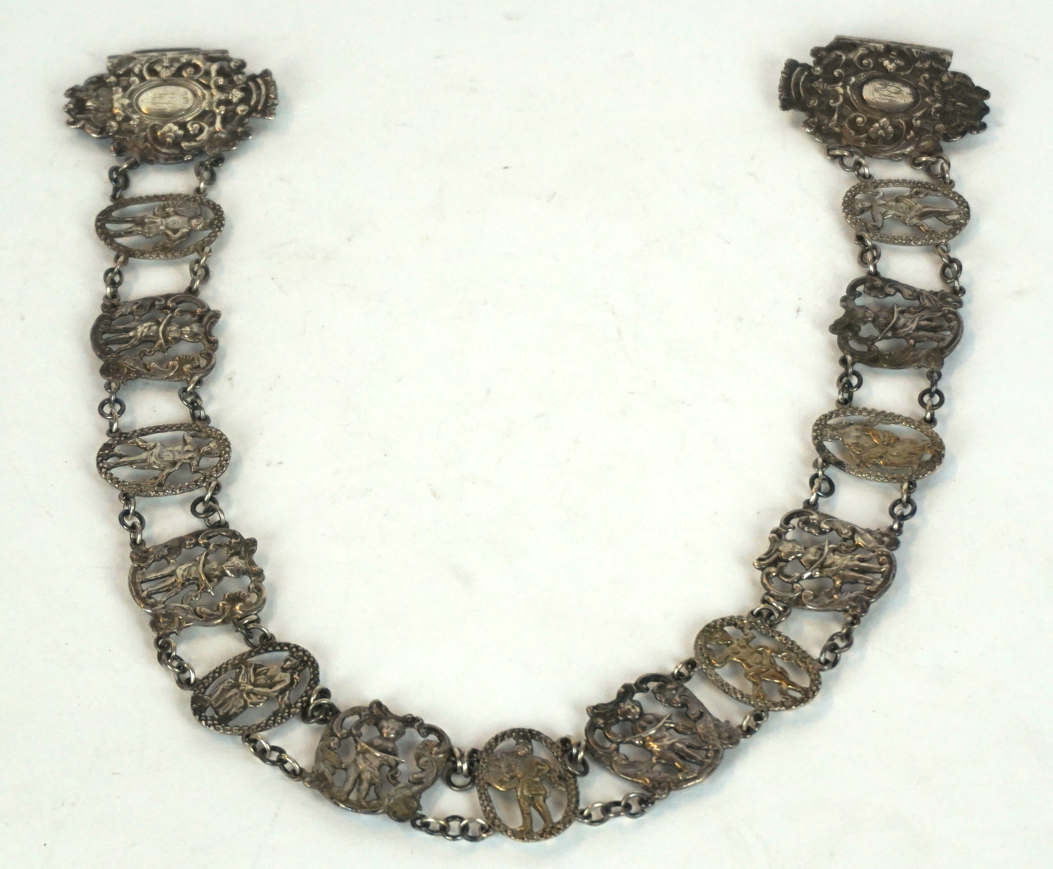 An early 20th Century silver-plated belt