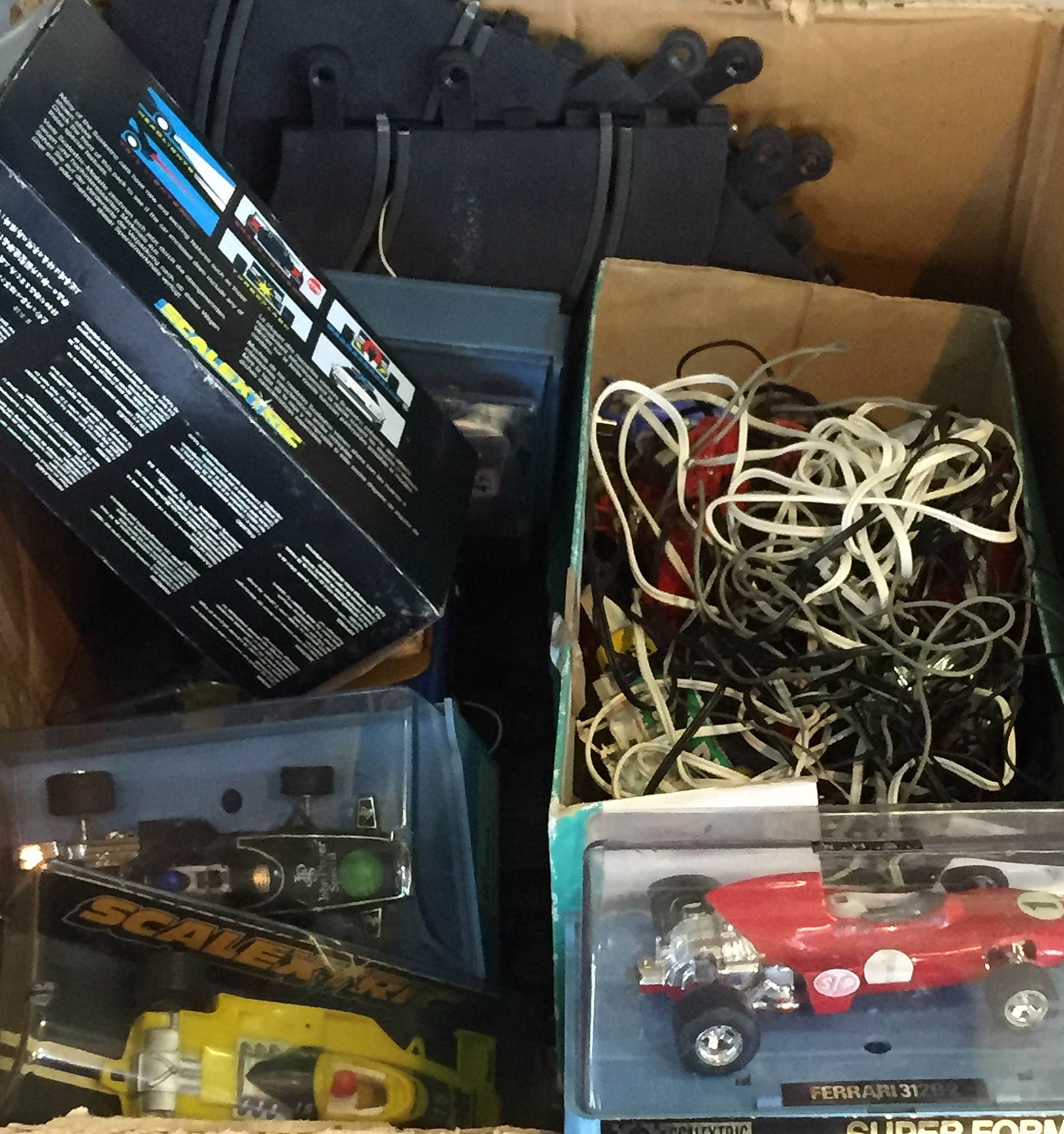 A collection of 1960s and later Scalextric items including various cars,