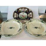 A pair of Wedgwood creamware plates decorated with conch shell design around the rim,