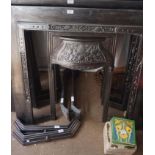 A pair of reproduction Victorian style cast iron fire surrounds with ceramic tiles.