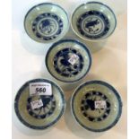 A set of five Chinese blue and white transparent rice design bowls,
