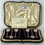 A cased set of Birmingham hallmarked silver tea spoons and sugar tong made by Elkington & Co,