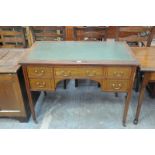 An Edwardian inlaid mahogany ladies writing desk with a green leather inset rectangular top above