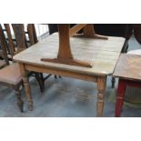 A Victorian plank top painted pine kitchen table.