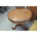 An Eastern brass inlaid hardwood circular centre table,