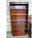 A Modern mahogany veneer freestanding open bookcase with 5 enclosed shelves