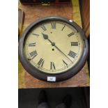 A Victorian mahogany cased wall clock with a single train movement, white dial and Roman numerals.