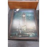 A Mother of Pearl inlaid Big Ben picture clock
20th Century with a 5cm silvered dial,