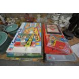 A Collection of vintage boxed board games including Totoplay and Risk and 3 wicker baskets.