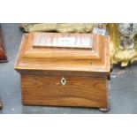 An early Victorian tea caddy
Of sarcophagus form the hinged lid with a rectangular panel enclosing a