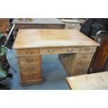 A Victorian pine twin pedestal desk with 3 frieze drawers each pedestal with 3 drawers.