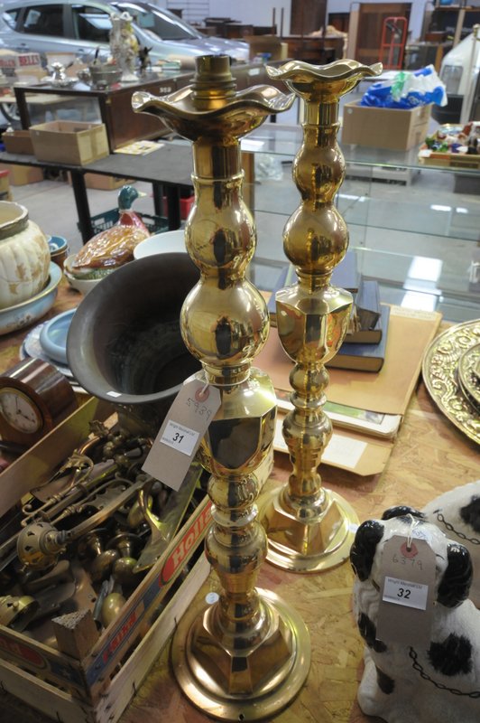 A Pair of modern large brass candlesticks.