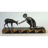 Art Deco, circa 1930 spelter figure group
Depicting a girl wearing a patinated dress,