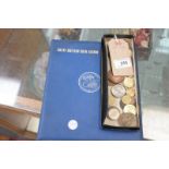 A Collection of commemorative and British coins to an album and a qty of loose coins.