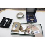 A Collection of jewellery including a white metal bangle inset with semi precious stone roundels,