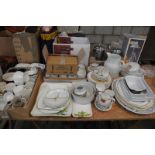 A Large qty of kitchenalia, ramekins, decorative plates, tea and dinner wares,