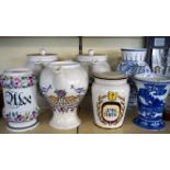 Six assorted reproduction Italian style drug jars together with a Wedgwood Fallow deer vase.