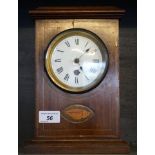 An Edwardian inlaid mahogany mantel clock of rectangular form.