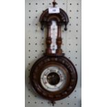 An early 20th Century mahogany banjo barometer of small proportions.