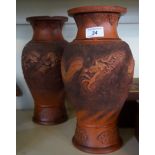 A pair of Chinese terracotta vases,