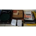 A vintage HMV gramophone player, assorted records and Beatles memorabilia.