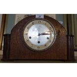 A 1920/30's oak mantel clock.