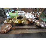 An Antique copper warming pan with an ebonised turned handle, a second copper warming pan,