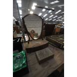 A 19th Century mahogany shield shaped toilet mirror with a 3 drawer plinth and an inlaid eastern