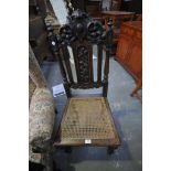 A Carolean style oak side chair.
