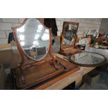 A Mahogany shield shaped dressing table mirror, a Victorian mahogany toilet mirror ,