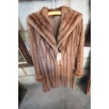 A Ladies vintage three quarter length fur coat.