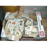 A Collection of cigarette cards to a box.