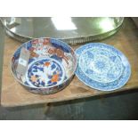 A Japanese Imari bowl and 2 Chinese blue and white plates.