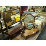 A 19th century inlaid mahogany dressing table mirror with a bow front 3 drawer plinth and an oak