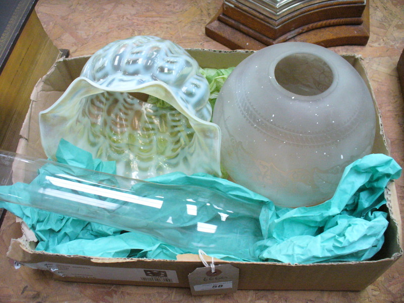 A Victorian vaseline glass shade with a wavy border and a second etched frosted glass spherical