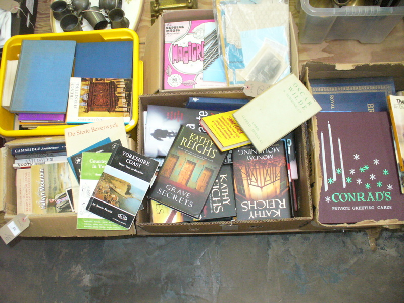 5 Boxes of miscellaneous books.