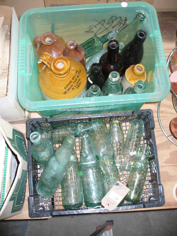 A Collection of old glass bottles and stoneware flagon's.