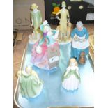 4 Royal Doulton figurines " Autumn Breezes " , " The Favourite " ,