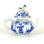 A Chinese porcelain blue and white glazed teapot, 18th/19th Century 
Of small circular rounded form,