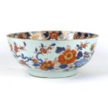 A Chinese Imari porcelain punch bowl, 18th Century 
Of circular form, raised on a high footring, the