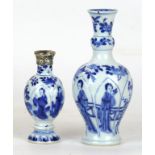 Two Chinese porcelain blue and white vases, late Qing Dynasty (1644-1912)
The first of baluster