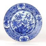 A Chinese Kangxi period (1662-1722) porcelain charger 
Of circular from, the deep well rising to a