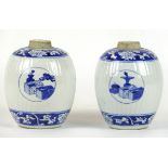 A pair of Chinese blue and white porcelain vases, late Qing Dynasty (1644-1912)
Each of ribbed ovoid