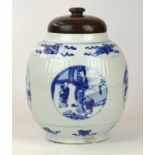 A Chinese porcelain blue and white vase, late Qing Dynasty (1644-1912)
The vase of ovoid ribbed