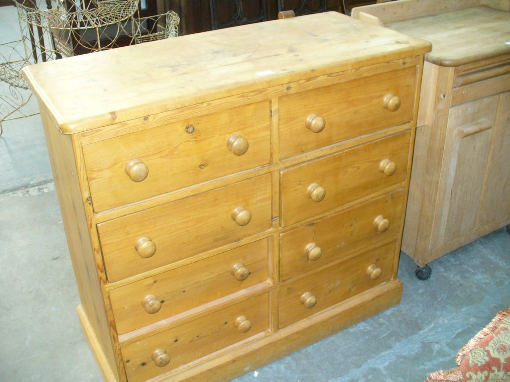 A Modern pine chest of 8 short drawers.