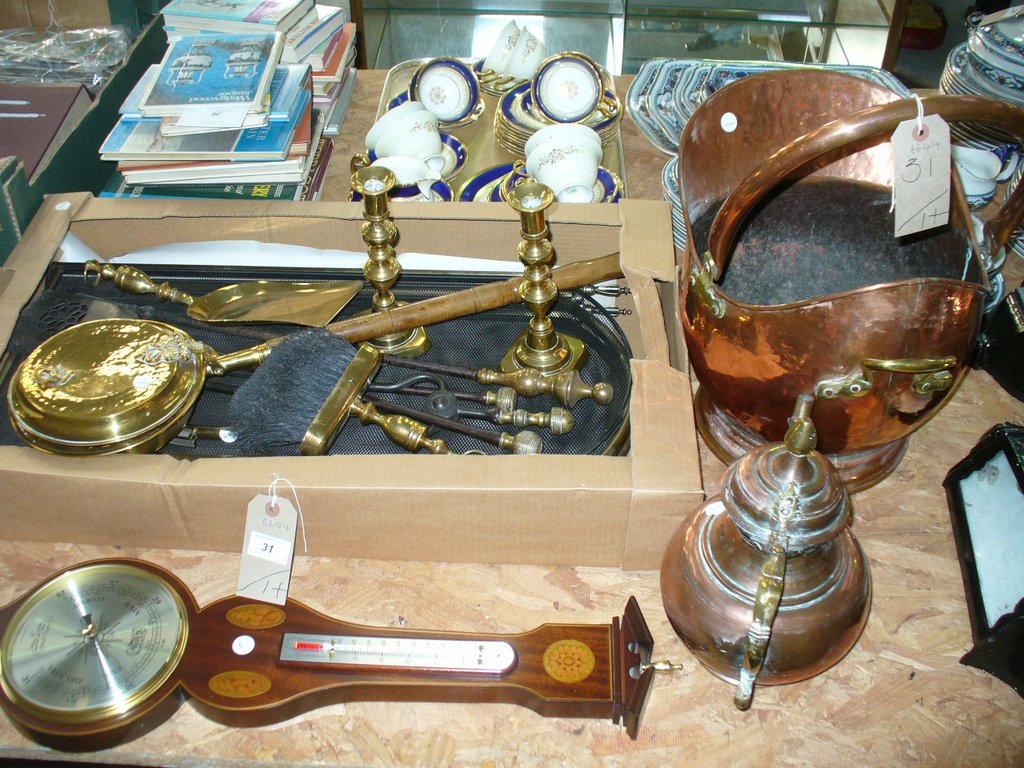 A Copper coal helmet , brass candlesticks, spark guard , reproduction inlaid wall barometer,