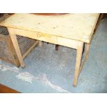 A Rectangular rustic pine kitche table with a single frieze drawer.